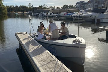 Friends in a boat on the dock