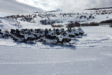 a group of snowmobiles