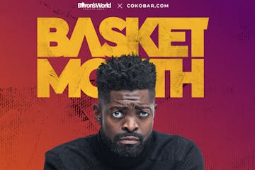 Basketmouth sitting on top of a book