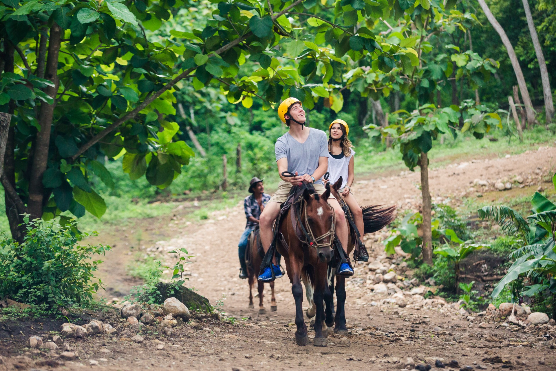 a man riding a horse on a trail at Vandará