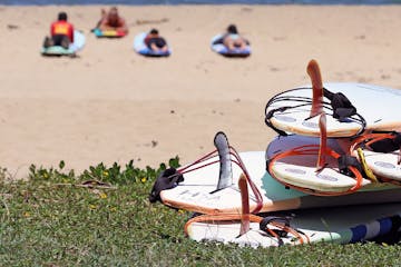 a group of shoes on a beach