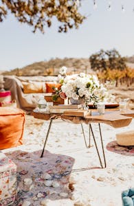 a private picnic set up for a surprise marriage proposal in wine country