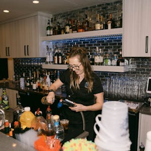 a person bartending