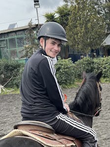 Reiley McClendon riding a horse