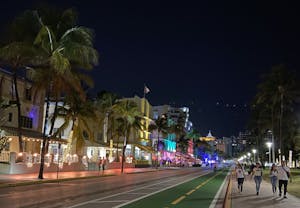 ocean drive art deco street at night neon lights miami