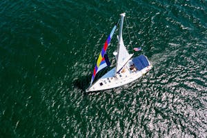 Drone shot of SY Ohana sailing in the water