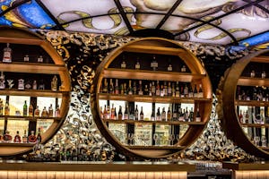 Immerse yourself in the vibrant atmosphere of the World of Wine's bar, where the selection of beverages complements the overall experience of this cultural and culinary destination