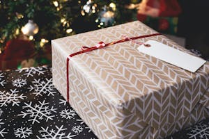 A beautifully wrapped Christmas gift, exuding festive charm and anticipation