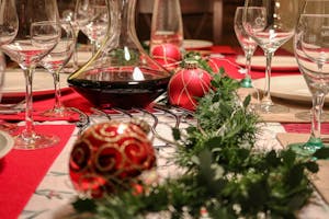 A thoughtfully arranged Christmas table with festive decor