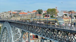 The Metro of Porto travels atop the iconic Luis I Bridge, connecting Gaia and Porto.