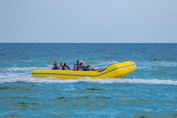 a group of people riding on a banana boat