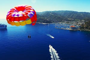 An aerial view of people parasailing in Catalina Island. 
