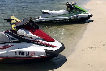 two jet skis on the beach