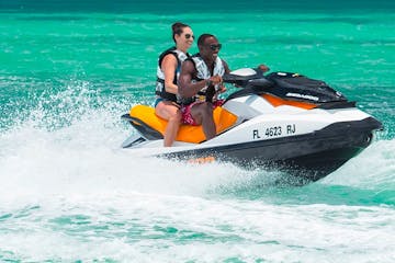 a man riding a jetski in the water