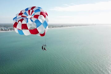 Parasailing in a body of water