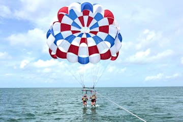 Parasailing in a body of water
