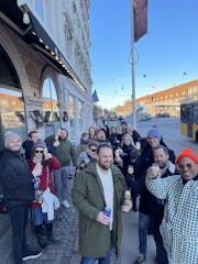 a group of people standing in front of Amager Bryghus Taproom