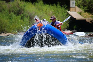 a group of people on a custom raft trip with pagosa adventure in pagosa springs, colorado