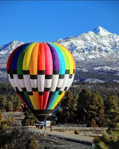 a colorful hot air balloon in the sky