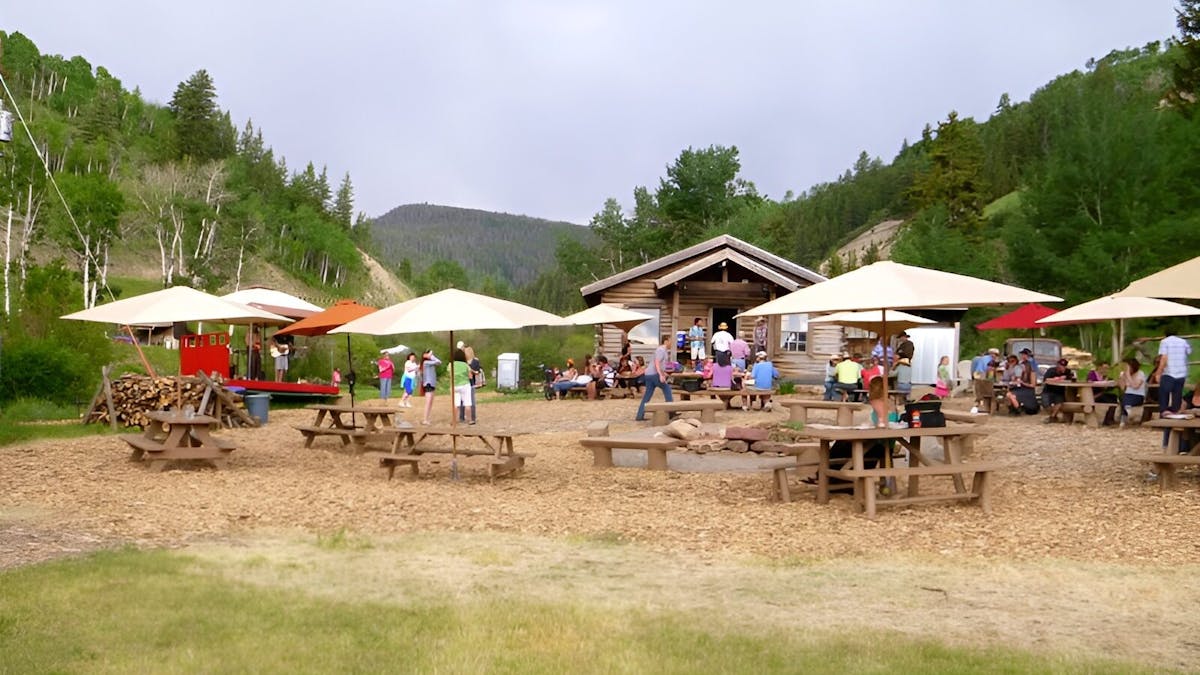 a group of people having an event at bearcat stables in edwards, colorado