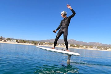 a person riding a surfboard in the water