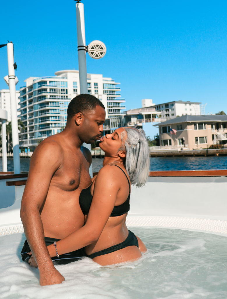 Couple kissing in hot tub boat in NYC