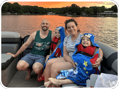 three kids smiling for the camera aboard carolina cruising charters' boat rental in lake norman, north carolina