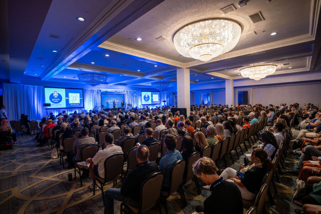 a large crowd of people in a room