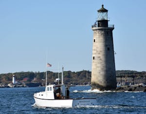Marie L passing by Rams Island Lighthouse