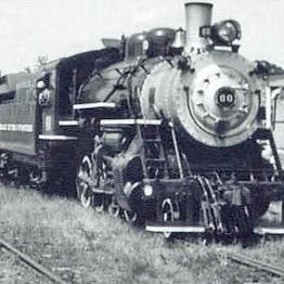 a vintage photo of an old train engine