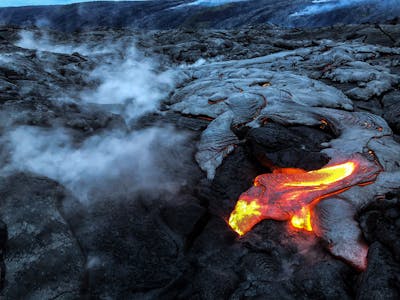 Lava flow emerging from the earth's surface